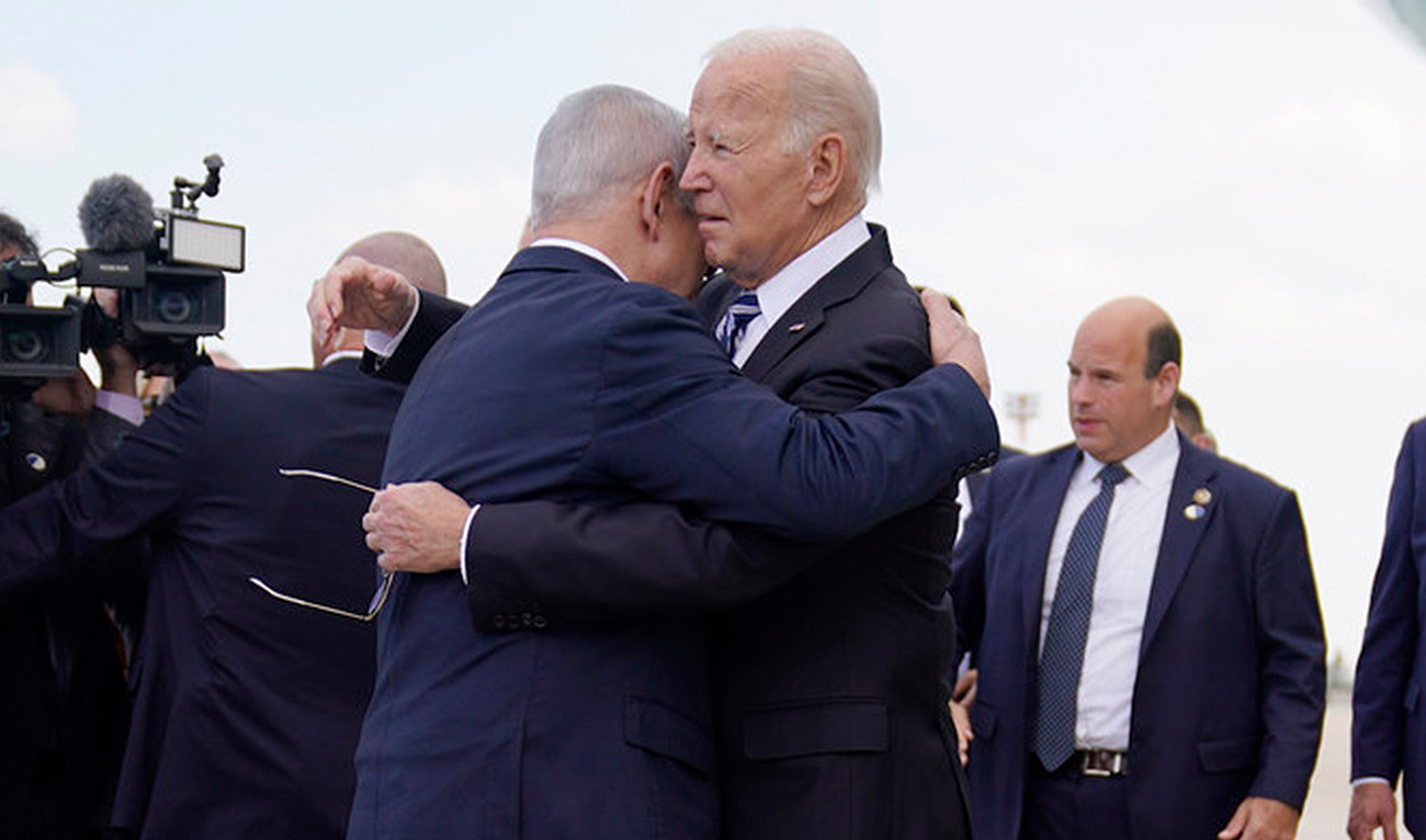 US President Joe Biden is greeted by Israeli Prime Minister Benjamin Netanyahu after arriving at Ben Gurion International Airport on Oct. 18, 2023 in Tel Aviv. (AP)