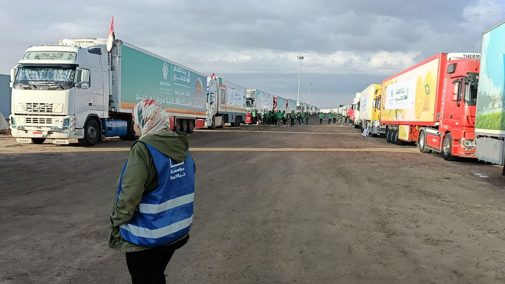 Trucks carrying humanitarian aid for Palestinians wait for the reopening of the Rafah crossing at the Egyptian side to enter Gaza on Oct. 17, 2023. (Reuters)