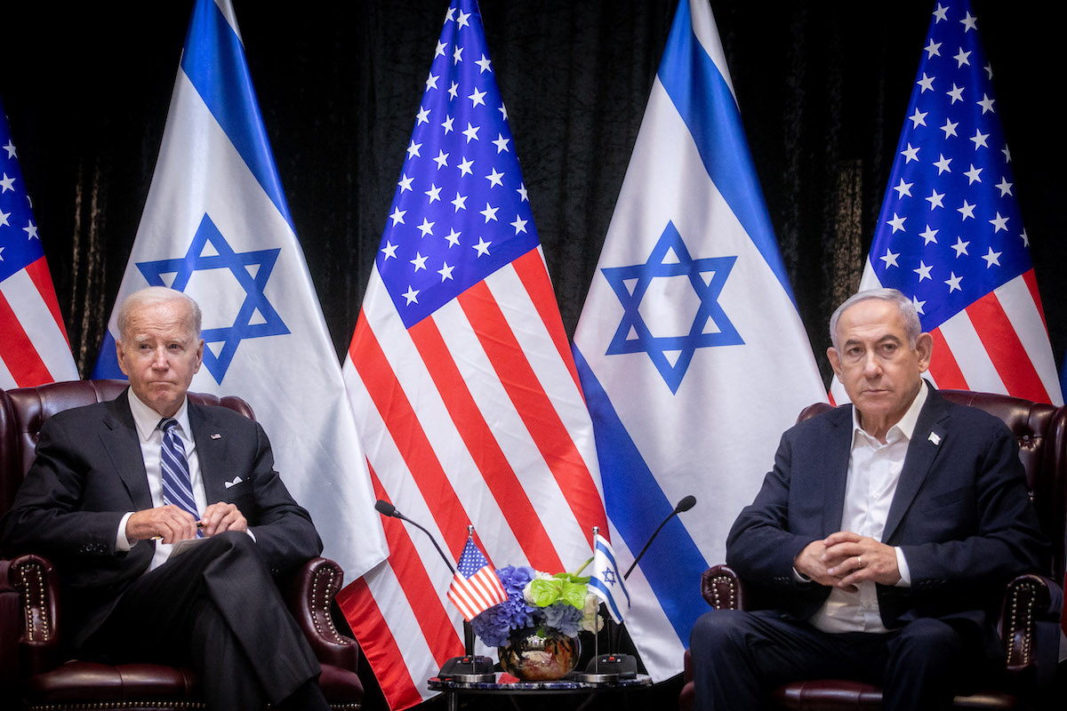 US President Joe Biden, sits with Israeli Prime Minister Benjamin Netanyahu, at the start of the Israeli war cabinet meeting, in Tel Aviv on October 18, 2023. (File/AFP)