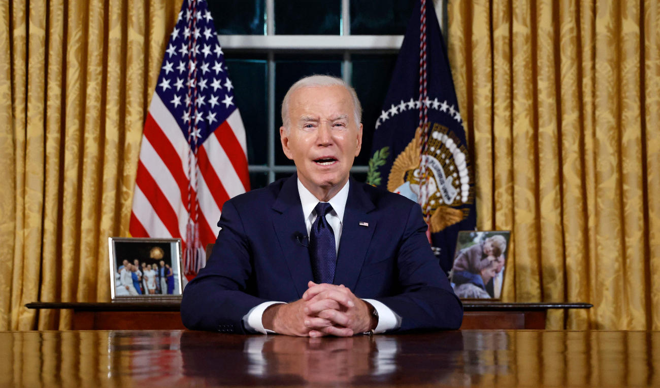 US President Joe Biden addresses the nation on the conflict between Israel and Gaza and the Russian invasion of Ukraine from the Oval Office of the White House in Washington, DC, on October 19, 2023. (AFP)