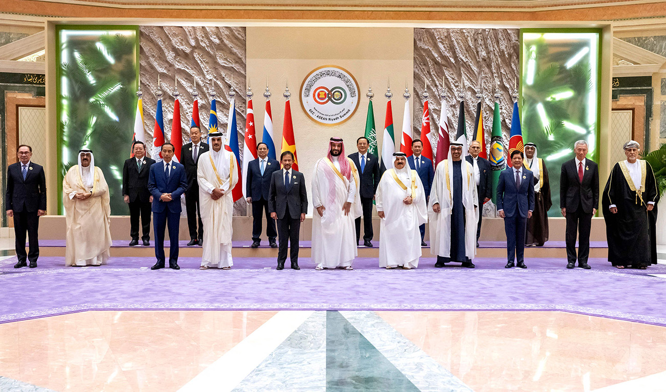 A hand out picture provided by UAE Presidential Court on October 20, 2023, shows (front L- R) Vietnam's Prime Minister Pham Minh Chinh, Crown Prince of Kuwait Sheikh Mishal al-Ahmad al-Jaber al-Sabah, President of Indonesia Joko Widodo, the Emir of Qatar Sheikh Tamim bin Hamad al-Thani, the Sultan of Brunai Haji Hassanal Bolkiah Muizzaddin Waddaulah, Saudi Arabia's Crown Prince Mohammed bin Salman bin Abdulaziz al-Saud, the King of Bahrain Hamad bin Isa al-Khalifa, President of the United Arab Emirates Sheikh Mohamed bin Zayed al-Nahyan, President of the Philippines Ferdinand Marcos Jr, Prime Minister of Singapore Lee Hsien Loong, and Deputy Prime Minister of Defense Affairs of Oman Sayyed Shihab bin Tarek bin Taimur al-Said, as they pose for a family photograph during the joint summit of the Gulf Cooperation Council (GCC) and the Association of Southeast Asian Nations (ASEAN), at King Abdulaziz International Convention Center. (AFP)