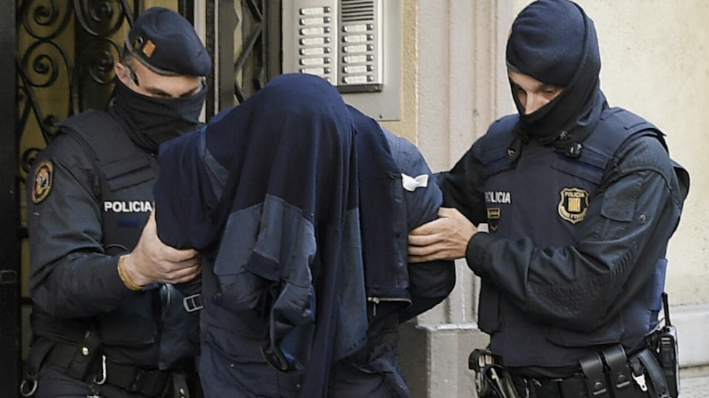 Police carried out property raids as part of the crackdown. One home was found to contain a “large samurai-style sword.” (AFP/File Photo)
