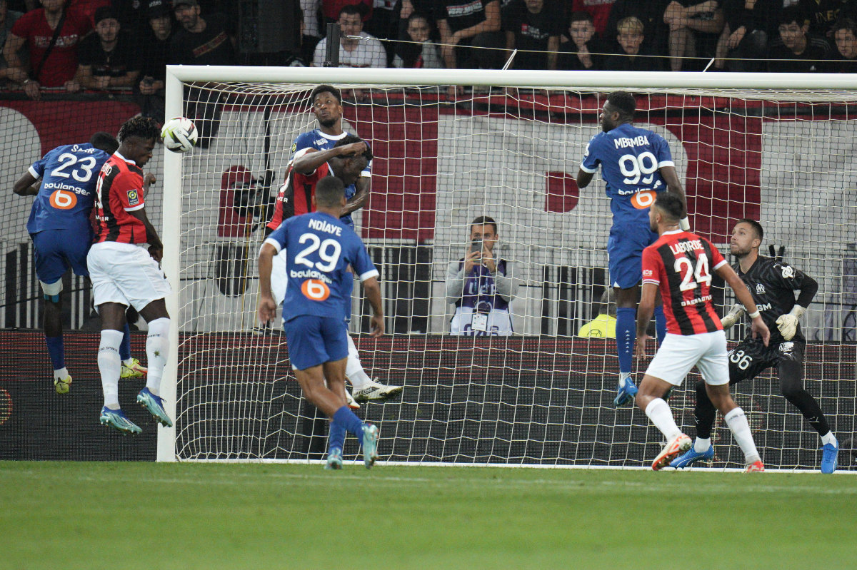 Nice edge 10-man Marseille 1-0 to go top in France