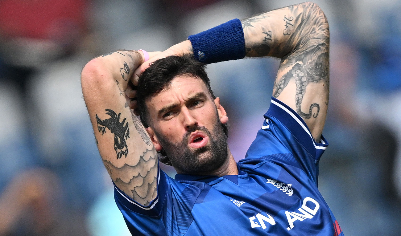 England's Reece Topley reacts during the 2023 ICC Men's Cricket World Cup one-day international (ODI) match between England and South Africa at the Wankhede Stadium in Mumbai, India on October 21, 2023. (REUTERS)