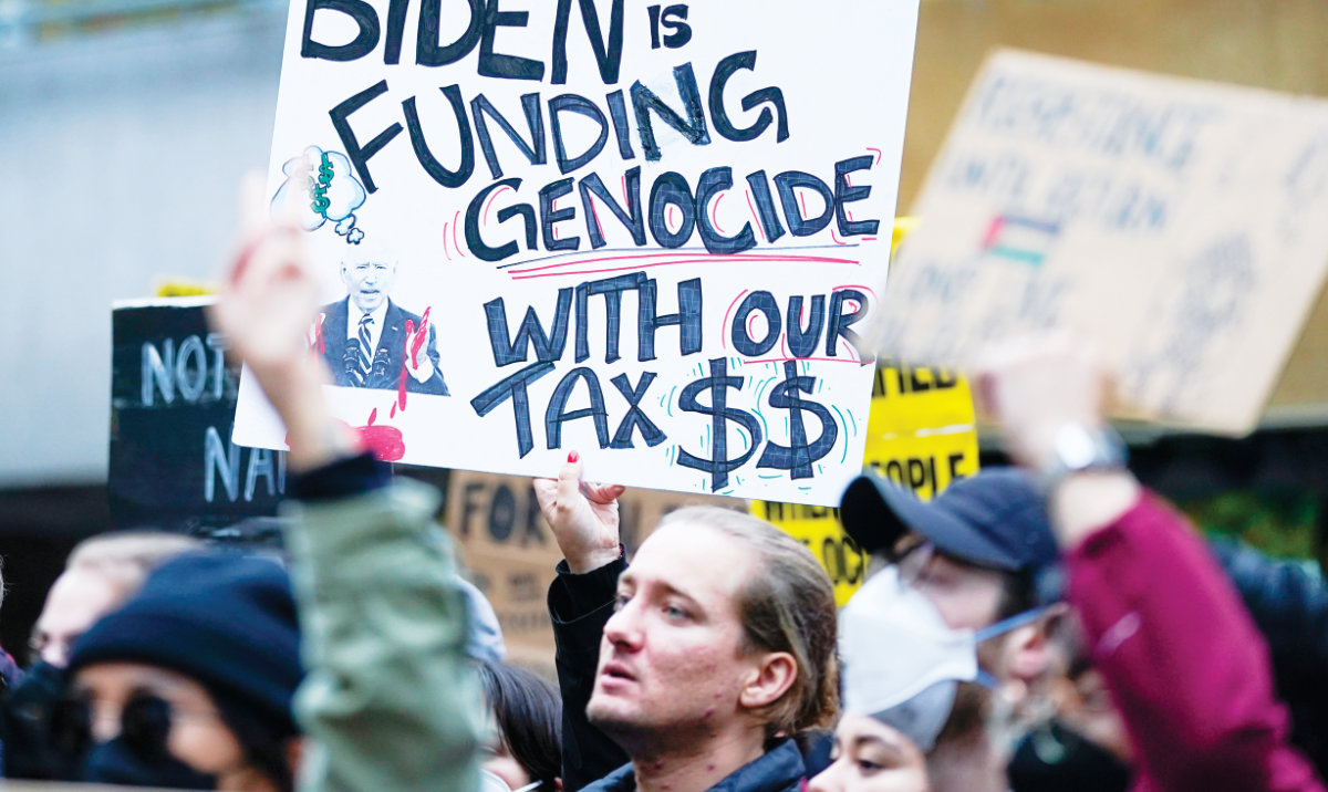 Protesters during a pro-Palestinian rally in Seattle. Lawmakers are urging the US government to call for an immediate de-escalation and ceasefire in Gaza. (AP)