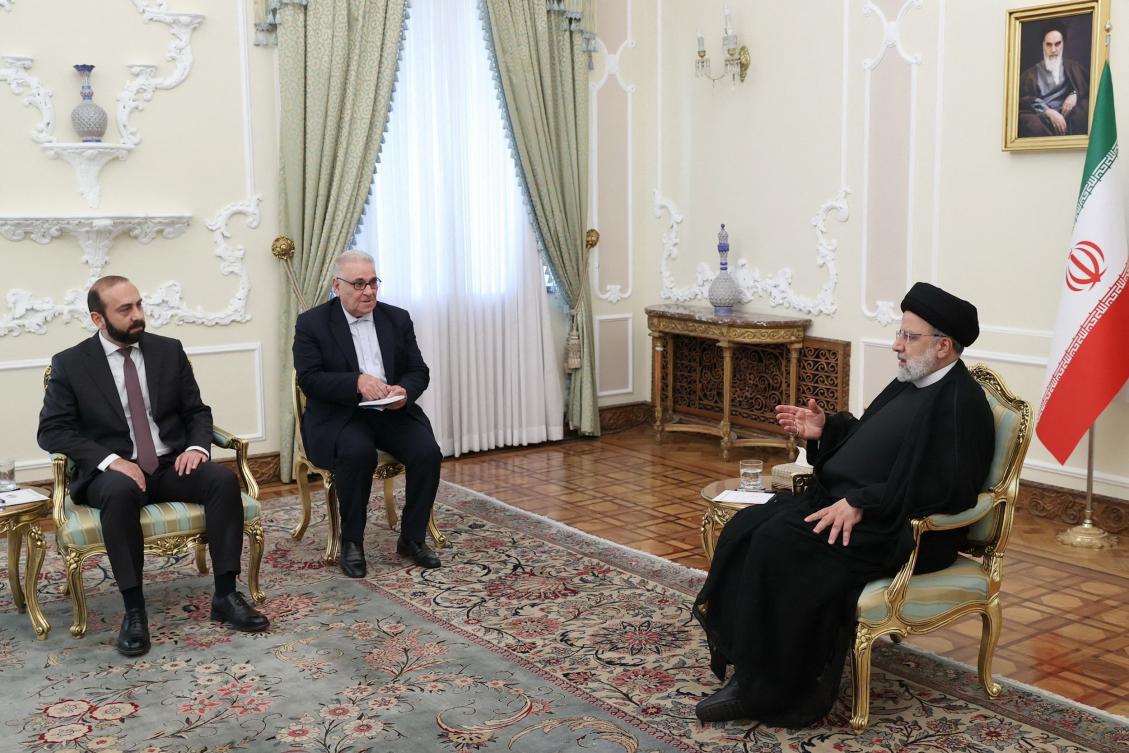 A handout picture provided by Iran's Presidency shows Iranian President Ebrahim Raisi (R) meeting with Armenian Foreign Minister Ararat Mirzoyan (L) in Tehran on October 23, 2023. (AFP)