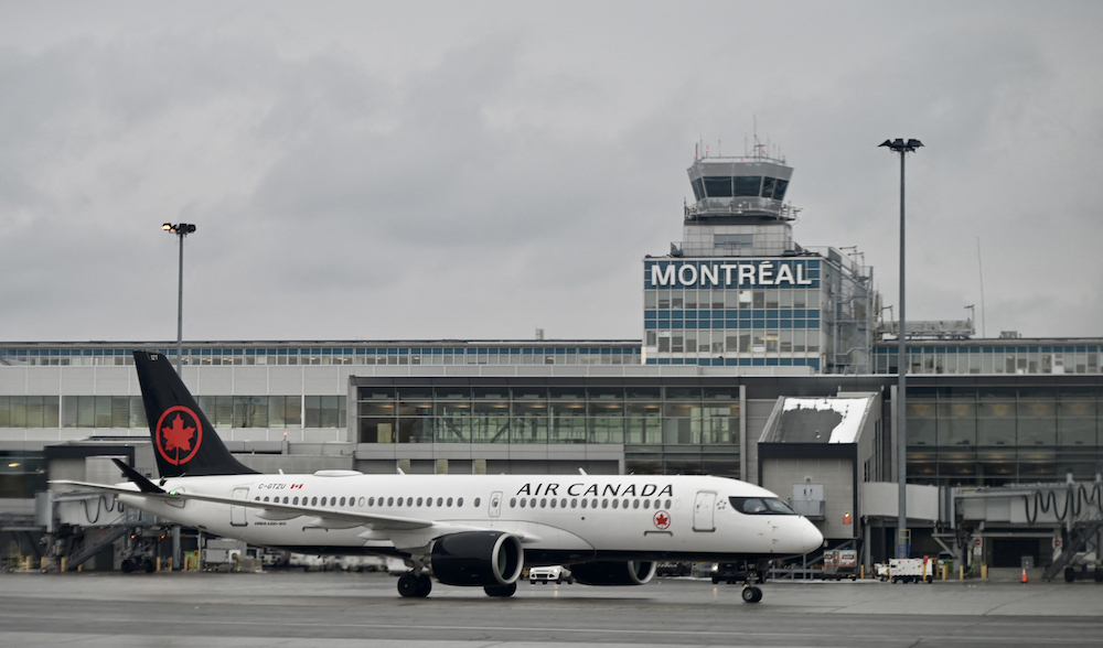 British MP Mohammad Yasin was held back for questioning by Air Canada staff before his flight from the UK, and suffered the same issues at Montreal airport in Canada. (AFP file photo)