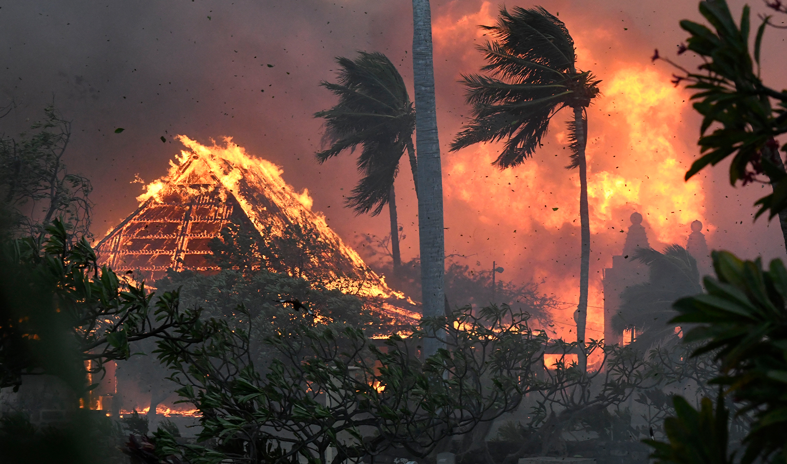 The hall of historic Waiola Church in Lahaina and nearby Lahaina Hongwanji Mission are engulfed in flames along Wainee Street in Lahaina, Hawaii, on August 8, 2023. (AP/File)
