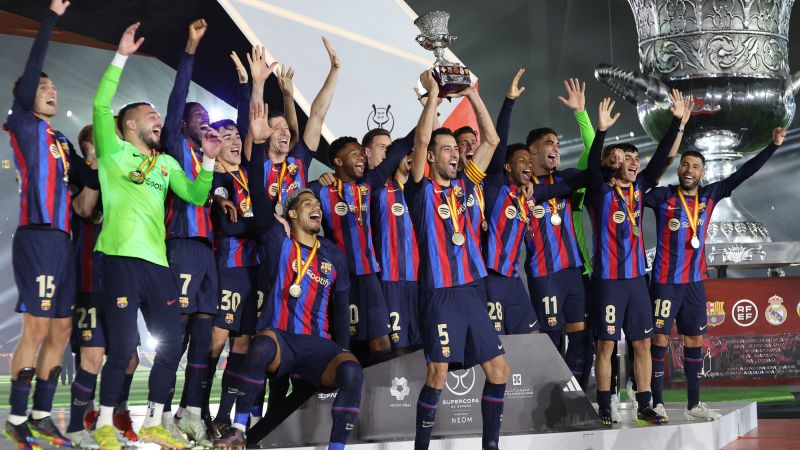 Barcelona players celebrate winning the 2023 Spanish Super Cup. (AFP)