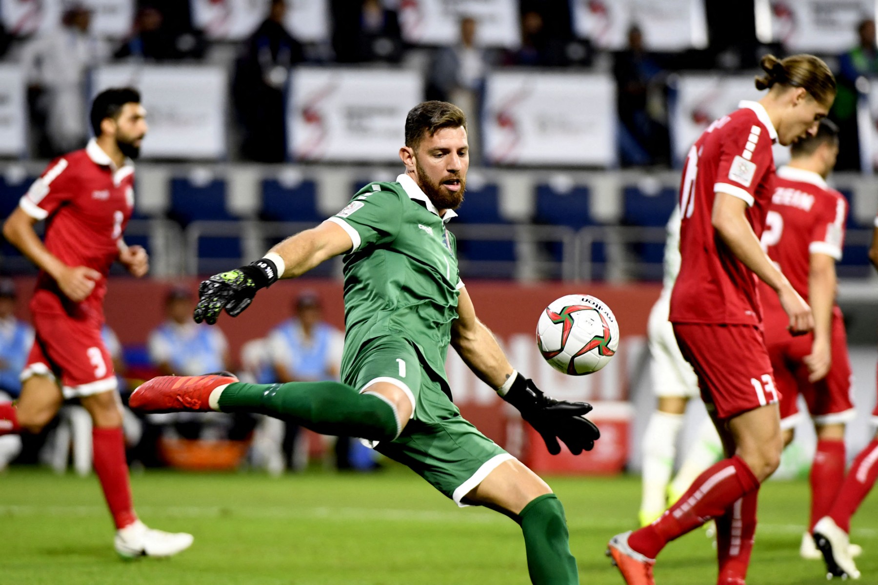 Lebanon's goalkeeper Mehdi Khalil kicks the ball during the 2019 AFC Asian Cup group E football match between Lebanon and Saudi Arabia at the Maktoum Bin Rashid Al-Maktoum Stadium in Dubai (AFP)