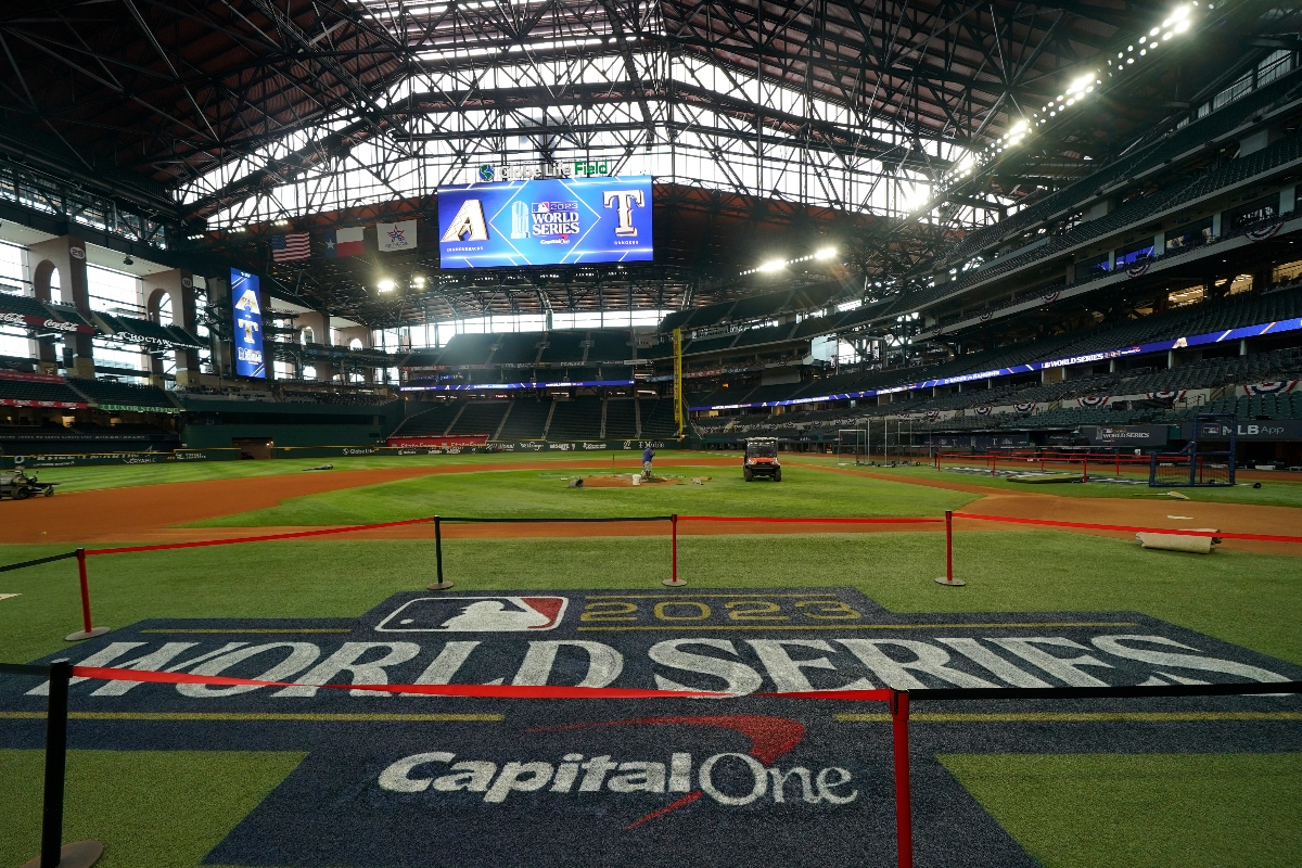 Signage is seen near the infield at Globe Life Field ahead of the World Series between the Rangers and Arizona Diamondbacks, Wednesday, Oct. 25, 2023, in Arlington, Texas. (AP Photo/Julio Cortez)