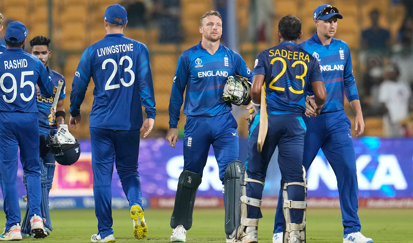 England's captain Jos Butler reacts after losing to Sri Lanka by 8 wickets during the ICC Men's Cricket World Cup match in Bengaluru, India, on October 26, 2023. (AP)