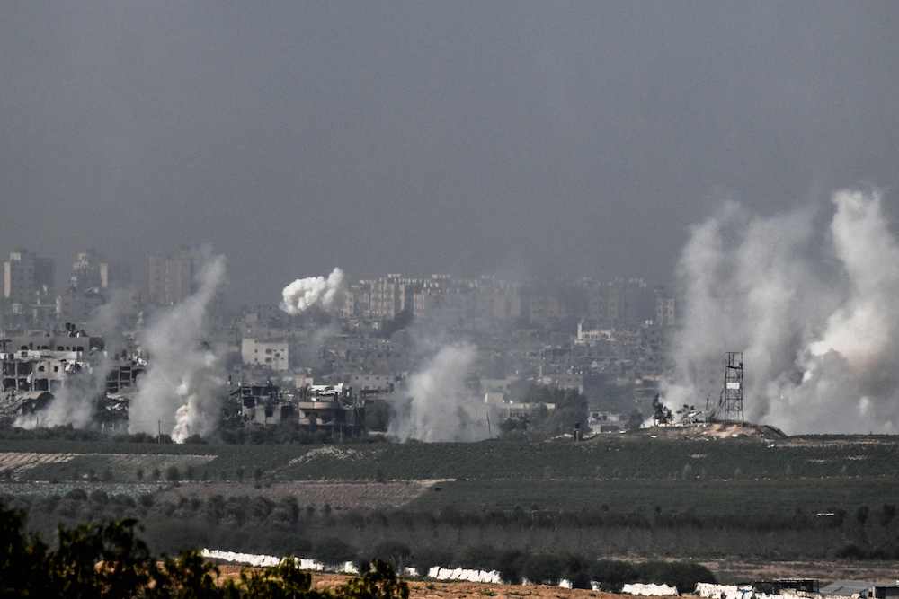 Israeli air strikes destroyed hundreds of buildings in Gaza overnight, the civil defense service said on Oct. 28, 2023. (AFP)