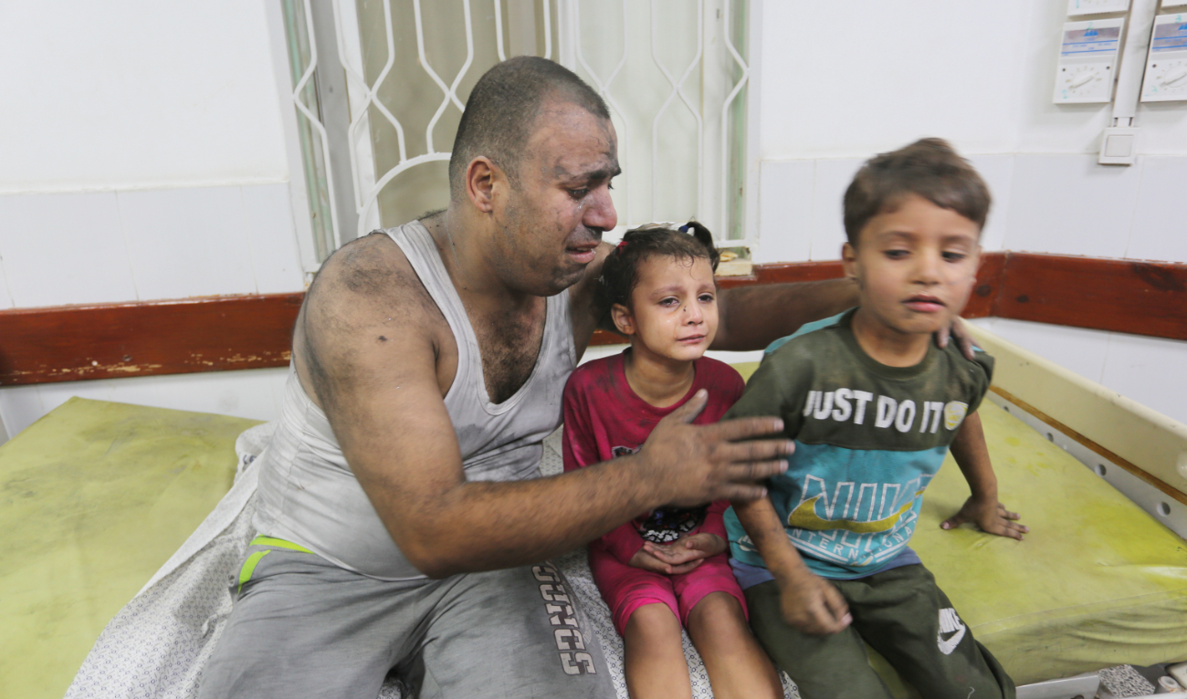 Palestinians wounded in an Israeli strike on the Gaza Strip wait for treatment in a hospital in Rafah on Monday. Concern has surged about the fate of hospitals in the war zone. (AP)