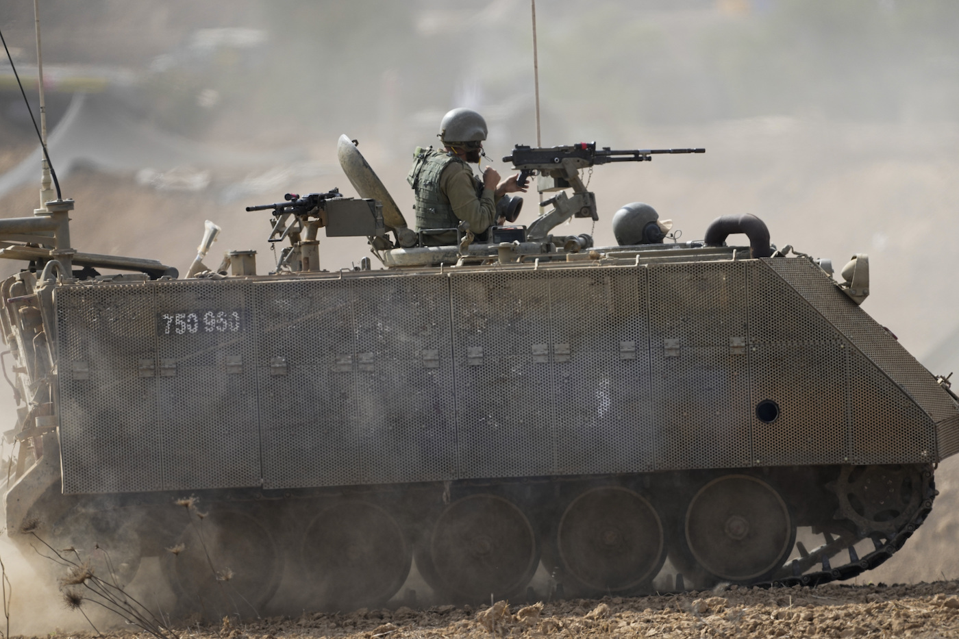 Israeli armored personnel carrier moves near the border with Gaza Strip on Tuesday, Oct. 31, 2023. (AP)