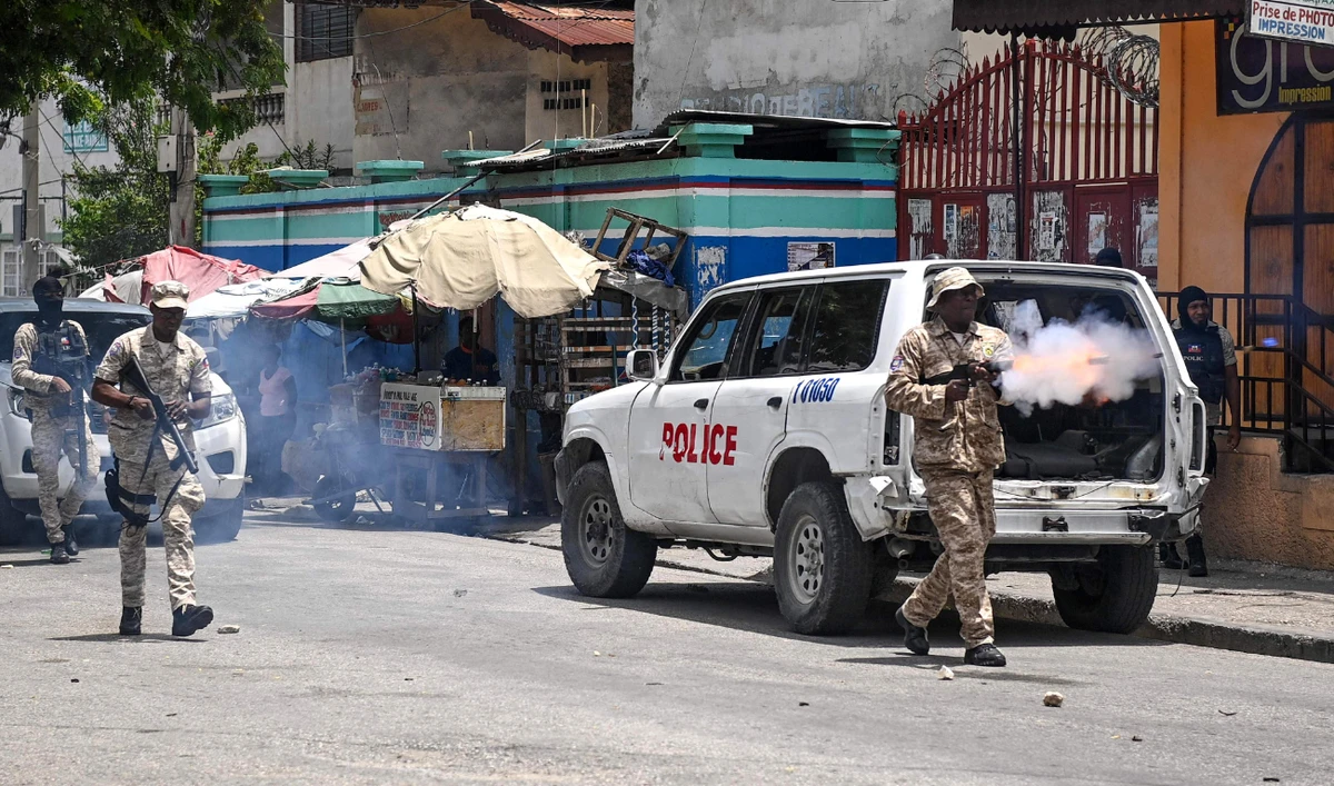 Police fire tear gas during a protest in Carrefour-Feuilles, a district of Haiti’s Port-au-Prince, on Aug. 14, 2023. (AFP/File)