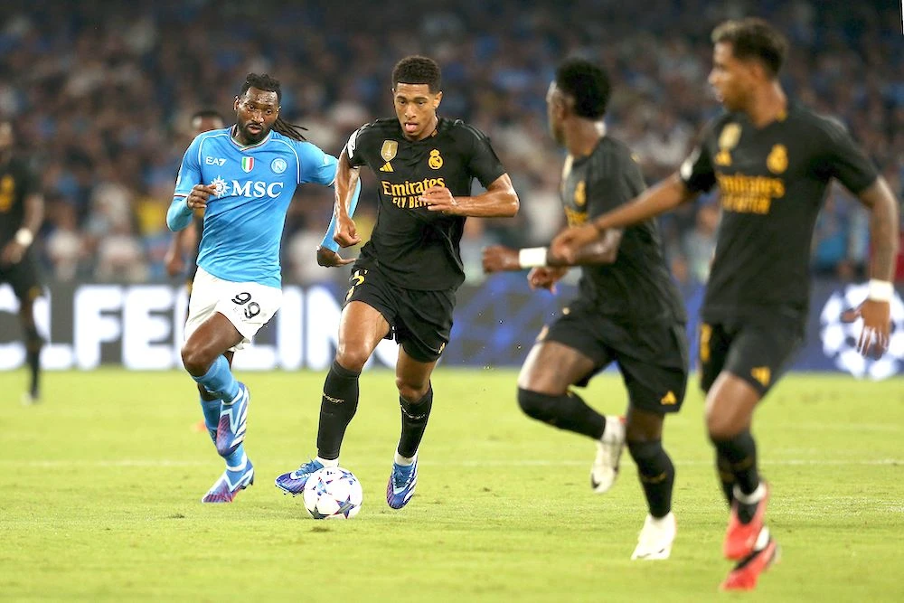 Real Madrid’s English midfielder Jude Bellingham, second left, during the UEFA Champions League match between Napoli and Real Madrid at the Diego Armando Maradona stadium in Naples on Tuesday. (AFP)