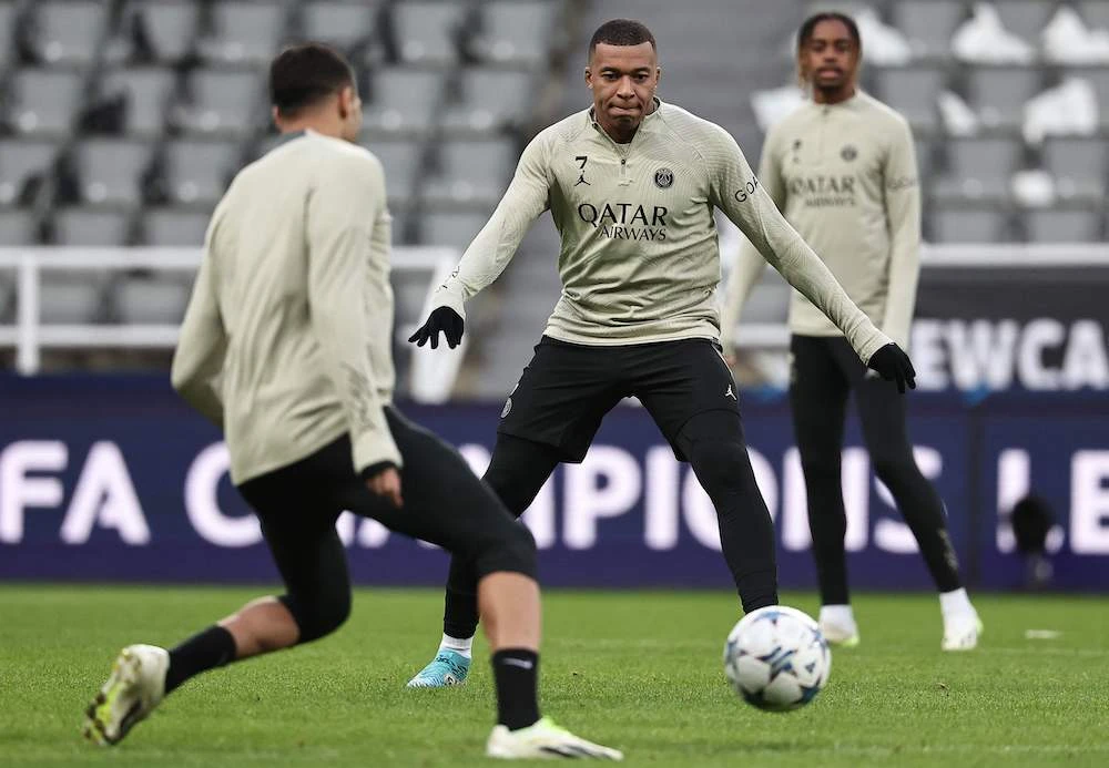 Paris Saint-Germain’s Kylian Mbappe attends a team training session at St James’s Park stadium in Newcastle-upon-Tyne on Oct. 3, 2023 on the eve of their match against Newcastle United. (AFP)