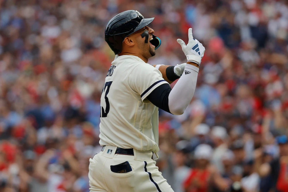 Minnesota Twins’ Royce Lewis celebrates as he reaches home plate after a solo home run during the third inning in Game 1 of an AL wildcard baseball playoff series Tuesday in Minneapolis. (AP)