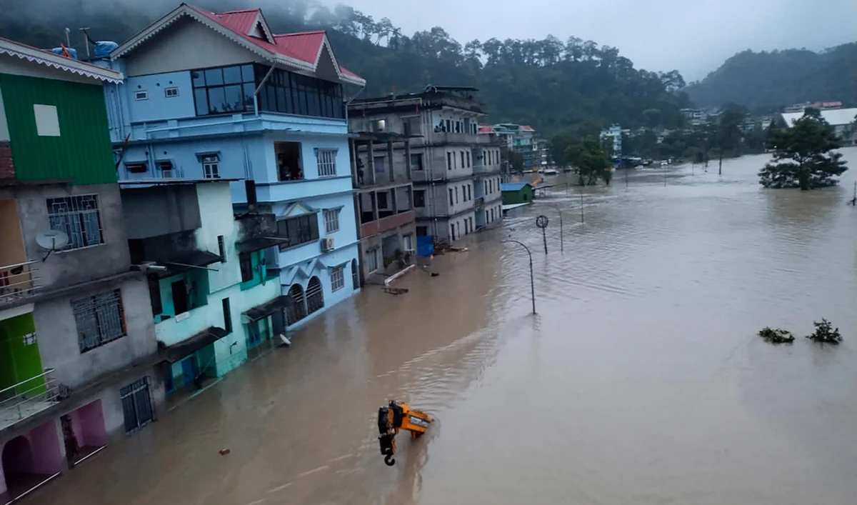 Flood waters inundate buildings along the Teesta river in Sikkim, India, on October 4, 2023. (Photo courtesy: AP)