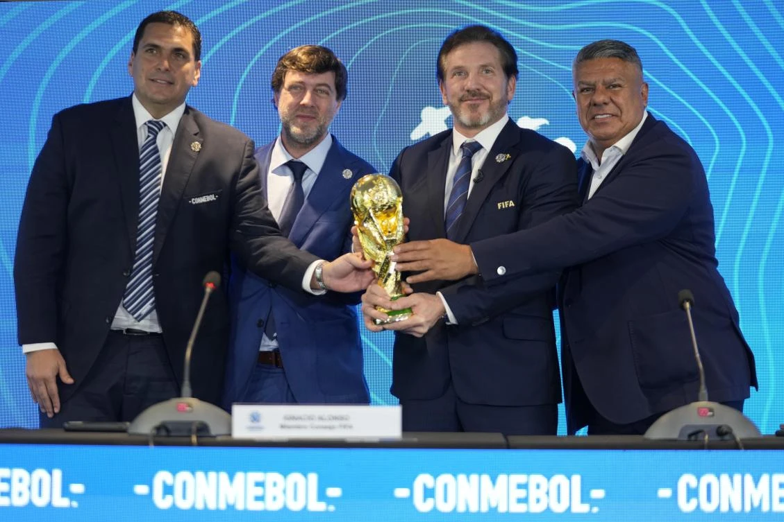 President Paraguay FA Robert Harrison, left, FIFA’s Ignacio Alonso, 2nd left, CONMEBOL President Alejandro Dominguez, 3rd left, and CONMEBOL VP Claudio Tapia, Luque, Paraguay, Oct. 4, 2023. (AP Photo)