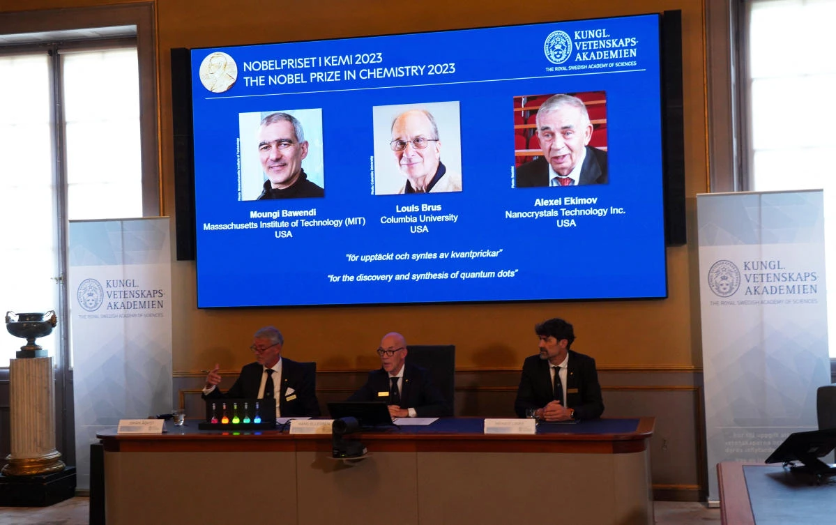 Hans Ellegren (center), Permanent Secretary of the Royal Swedish Academy of Sciences, announces the winners of the 2023 Nobel Prize in Chemistry during a press conference at the Royal Swedish Academy of Sciences in Stockholm on Oct 4, 2023. (Reuters)
