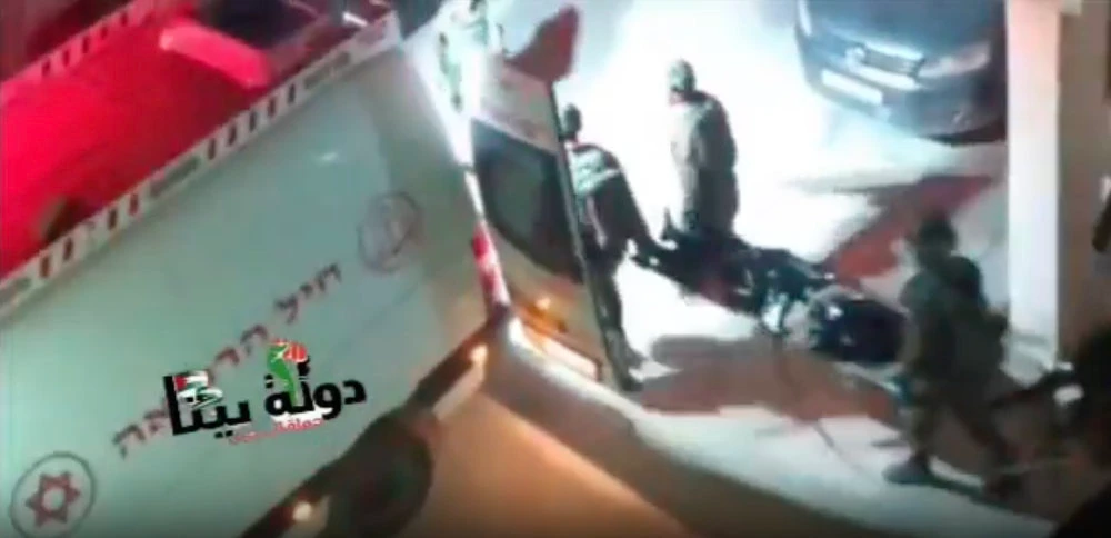 In this video grab, Israeli soldiers are seen taking away the body of a Palestinian gunman slain during clashes in Hawara town in the occupied West Bank on Oct. 5, 2023. (X: @QudsNen)