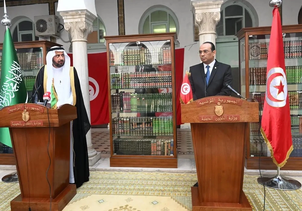 Saudi minister of Hajj and Umrah Tawfiq Al-Rabiah, left, with Tunisia’s Minister of Religious Affairs of Tunisia Ibrahim Chaibi. (SPA)