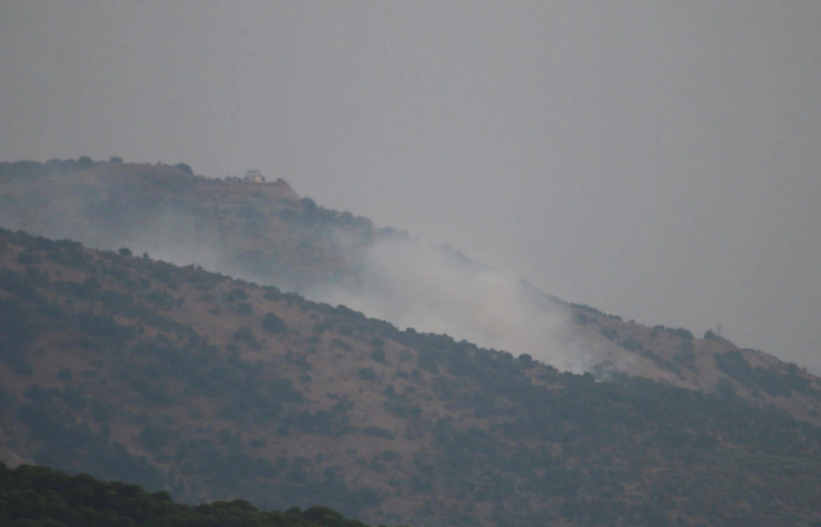 Smoke rises from Kfarchouba as seen from the village of Rashaya al-Foukhar, in southern Lebanon, on Oct. 10, 2023. (Reuters)