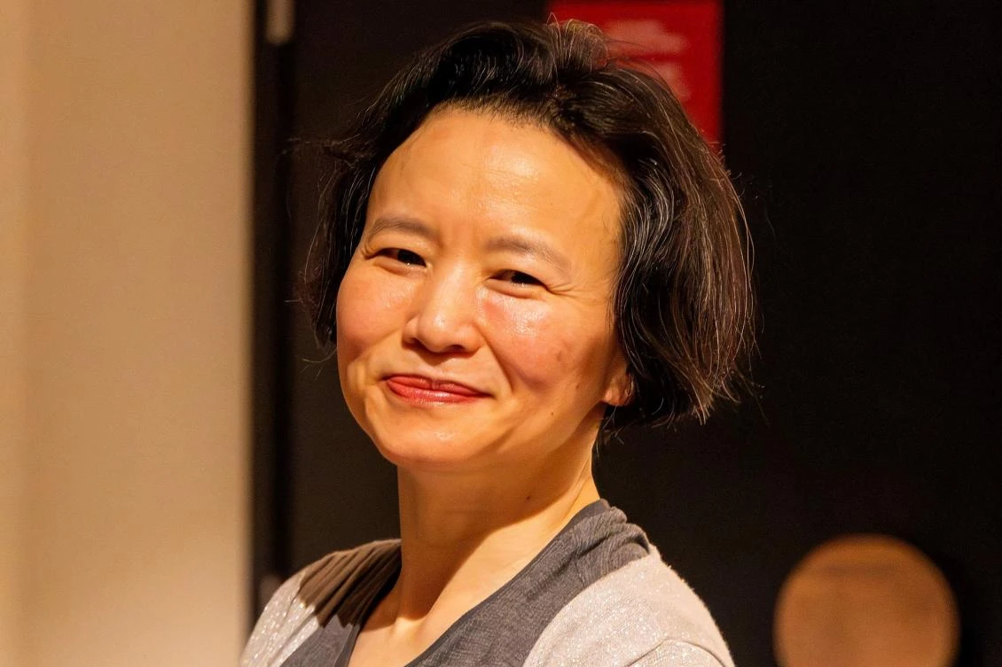 Above, Australian journalist Cheng Lei upon her arrival at the airport in Melbourne on Oct. 11, 2023. (Australia’s Department of Foreign Affairs and Trade/AFP)