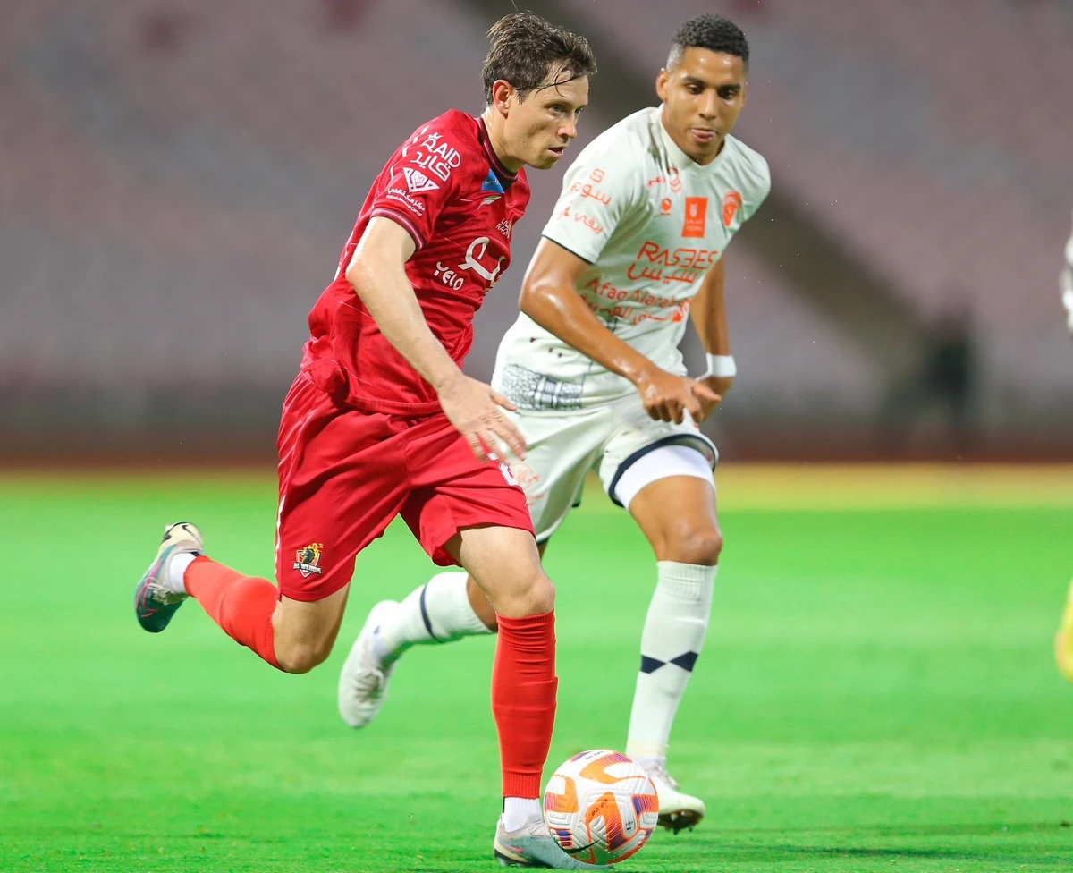 The Makkah-based Al-Wehda club bought the 32-year-old Australian World Cup star Craig Goodwin, left, late in the transfer window. (X: @alwehdaclub1)