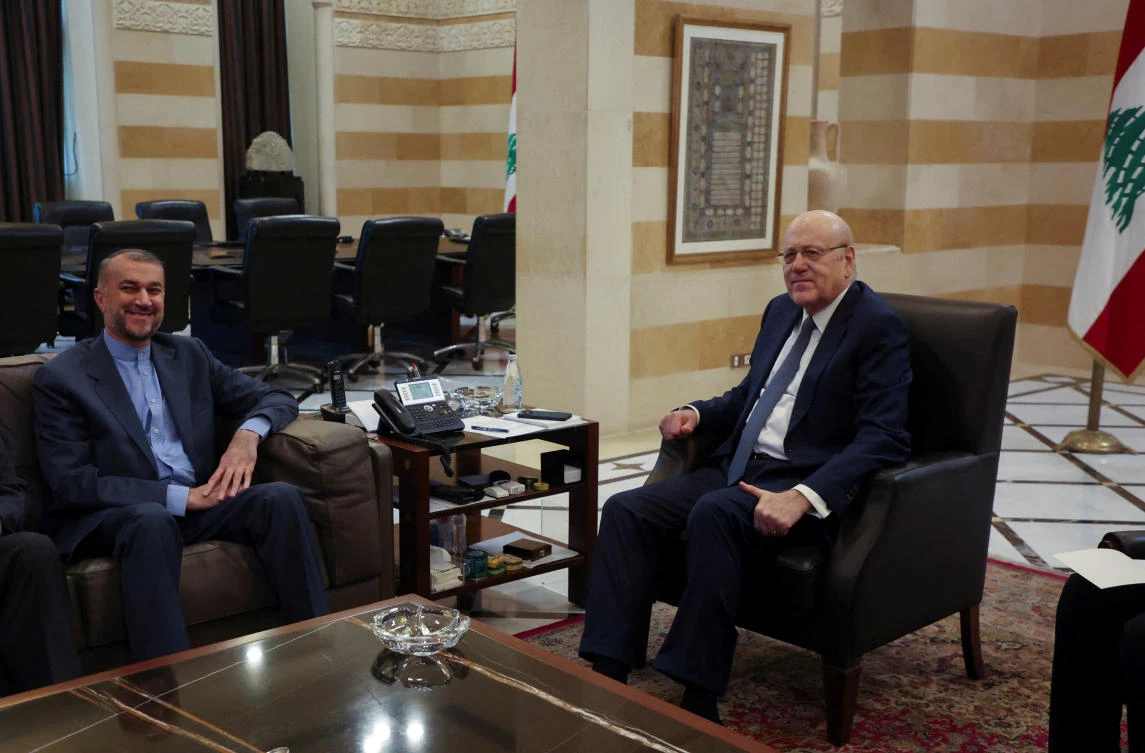 Lebanon's caretaker Prime Minister Najib Mikati meets with Iran's Foreign Minister Hossein Amirabdollahian in Beirut (REUTERS)