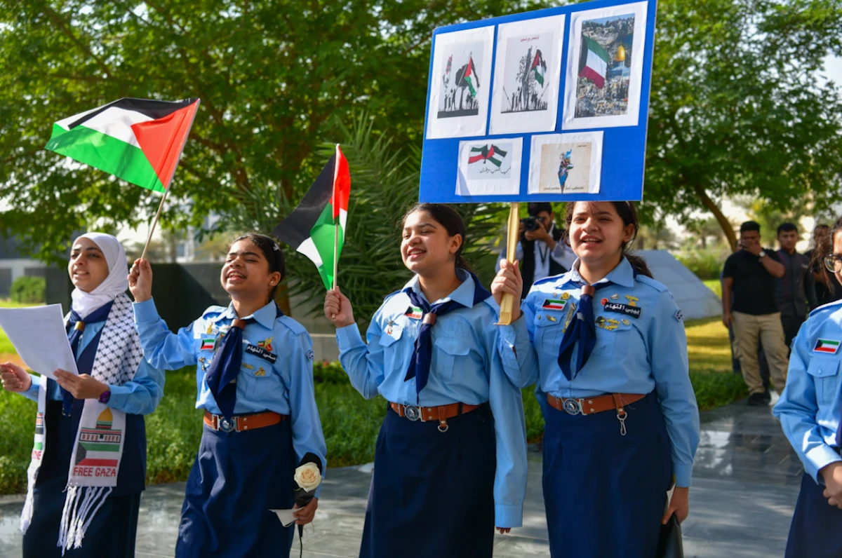 Kuwaiti schoolchildren carrying Palestinian flags and posters amid Israel's war on Gaza. (KUNA)