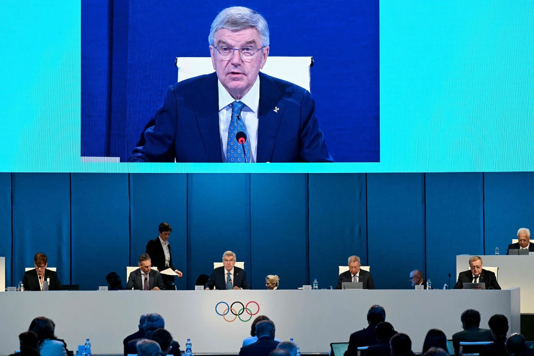 International Olympic Committee (IOC) President Thomas Bach (C, left) speaks on the first day of the 141st IOC Session in Mumbai on Sunday. (AFP)