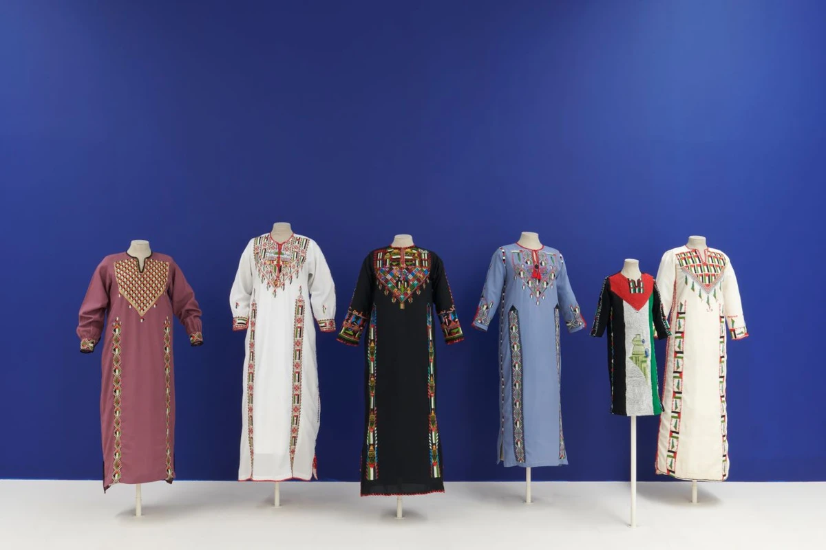 Intifada dresses, 1980s-1990s. Installation view of ‘Material Power: Palestinian Embroidery’ at Kettle’s Yard, Cambridge. (Photo by Jo Underhill)
