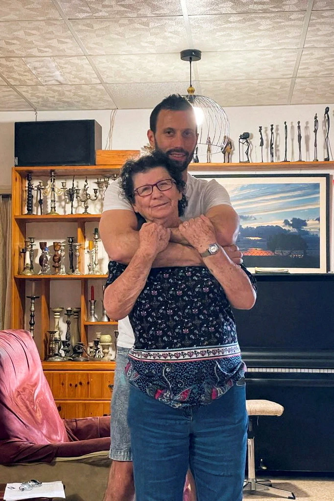 Yocheved Lifshitz, who was held as hostage by Palestinian Hamas militants, is seen with her grandson Daniel. (Reuters)