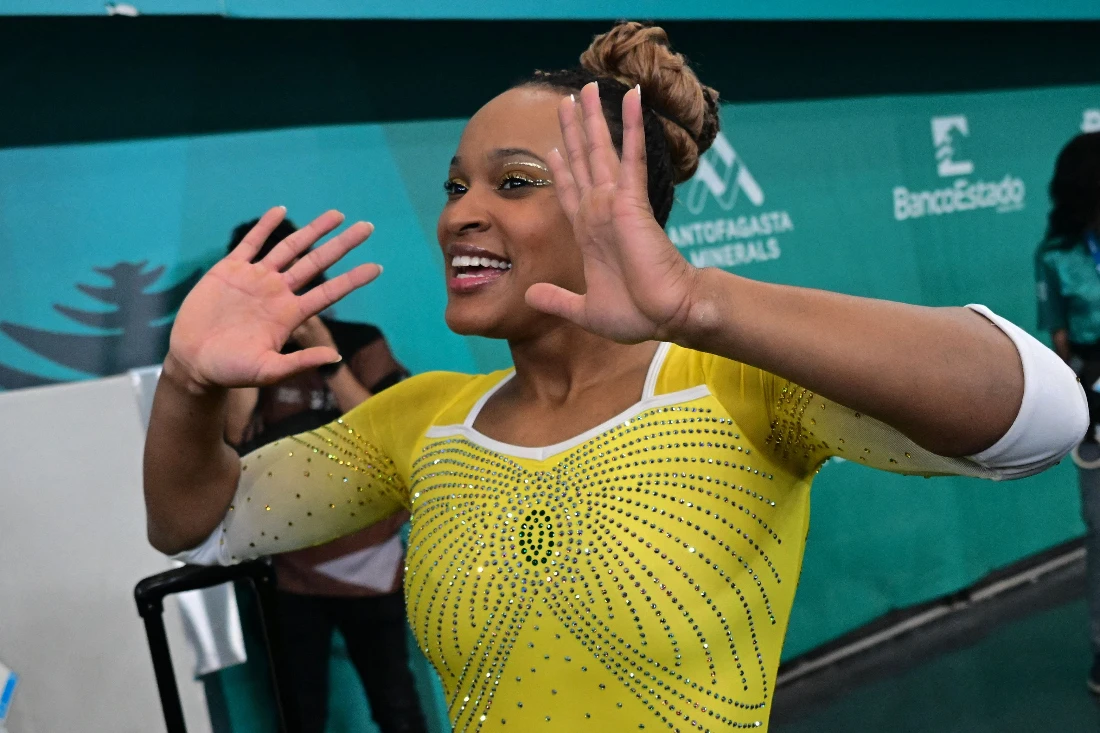 Brazil's Rebeca Andrade celebrates after winning the gold medal in the artistic gymnastics women's vault final during the Pan American Games Santiago 2023 at the Team Sports Centre in the National Stadium Sports Park in Santiago. (AFP)