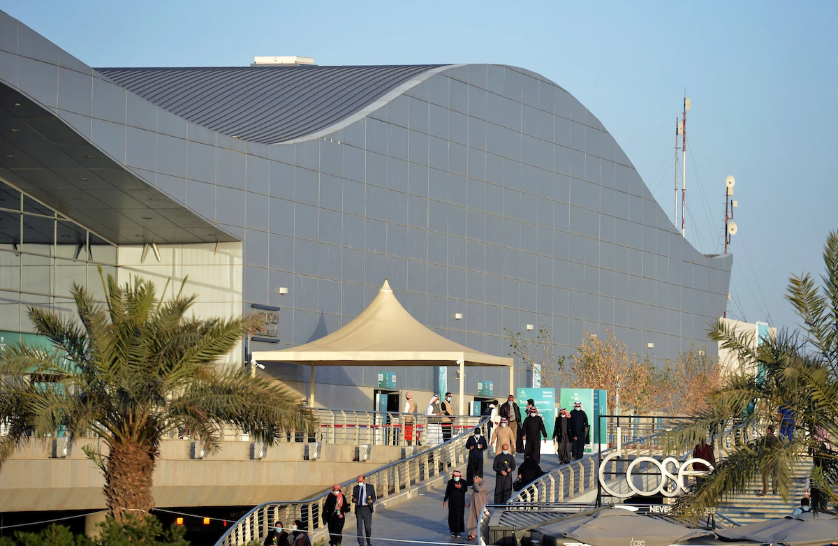 People arrive at the Riyadh International Convention and Exhibition Center. (File/AFP)