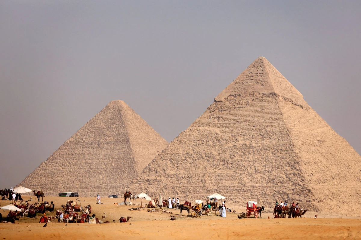 Tourists gather at the Pyramids of Giza, on the outskirts of Cairo, Egypt, on October 26, 2023. (REUTERS)