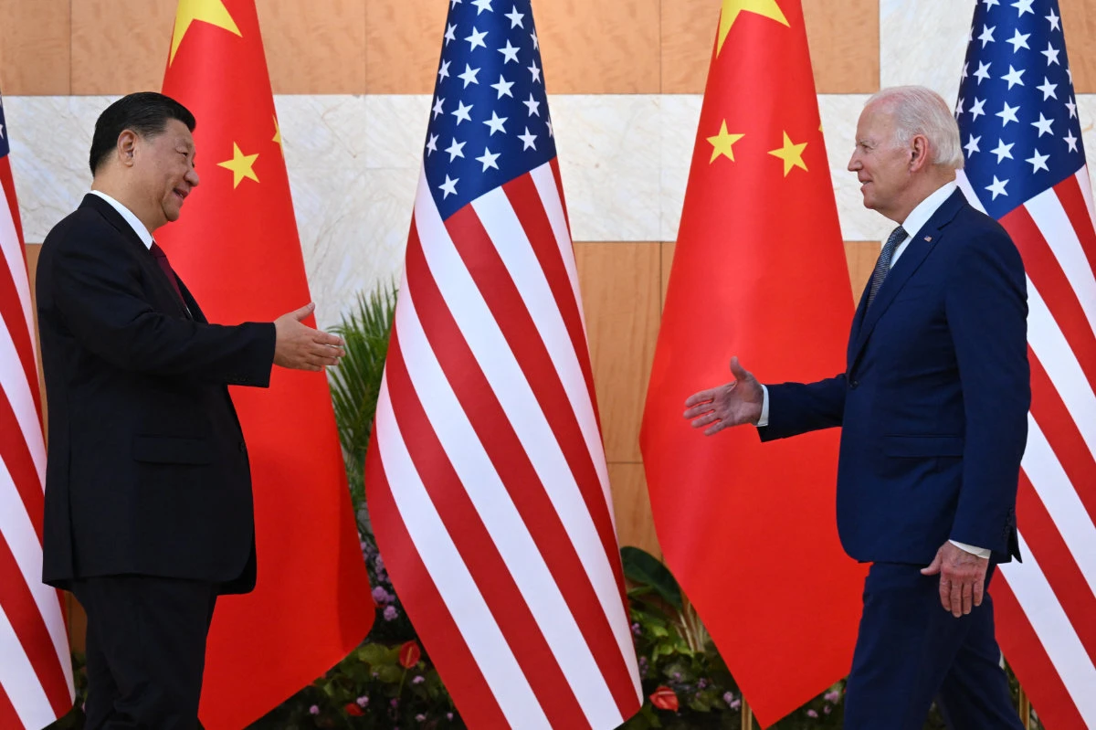 This photo taken on November 14, 2022, shows US President Joe Biden (R) and China's President Xi Jinping meeting on the sidelines of the G20 Summit in Bali, Indonesia. Arrangements are being made for another face-to-face meeting between the two leaders next month. (AFP/File photo)