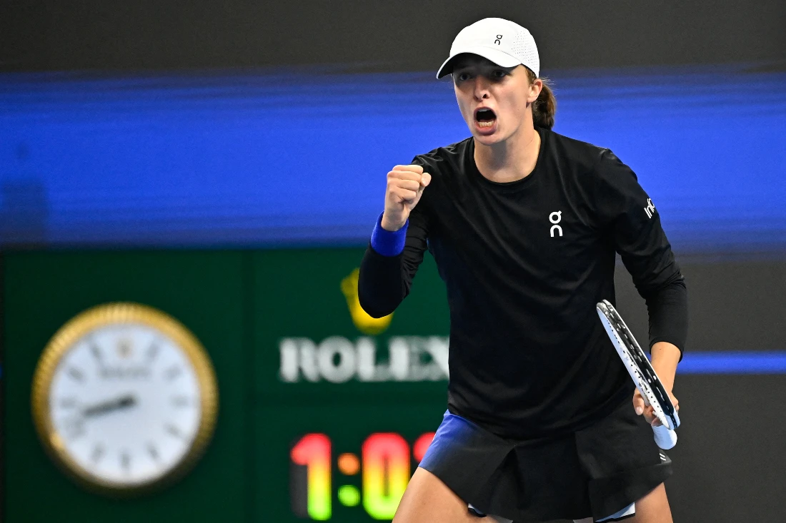 Poland’s Iga Swiatek won her WTA Finals opening match against Marketa Vondrousova on Monday. File photo shows Swiatek during her women’s singles final match against Russia's Liudmila Samsonova of the WTA China Open. (File/AFP)