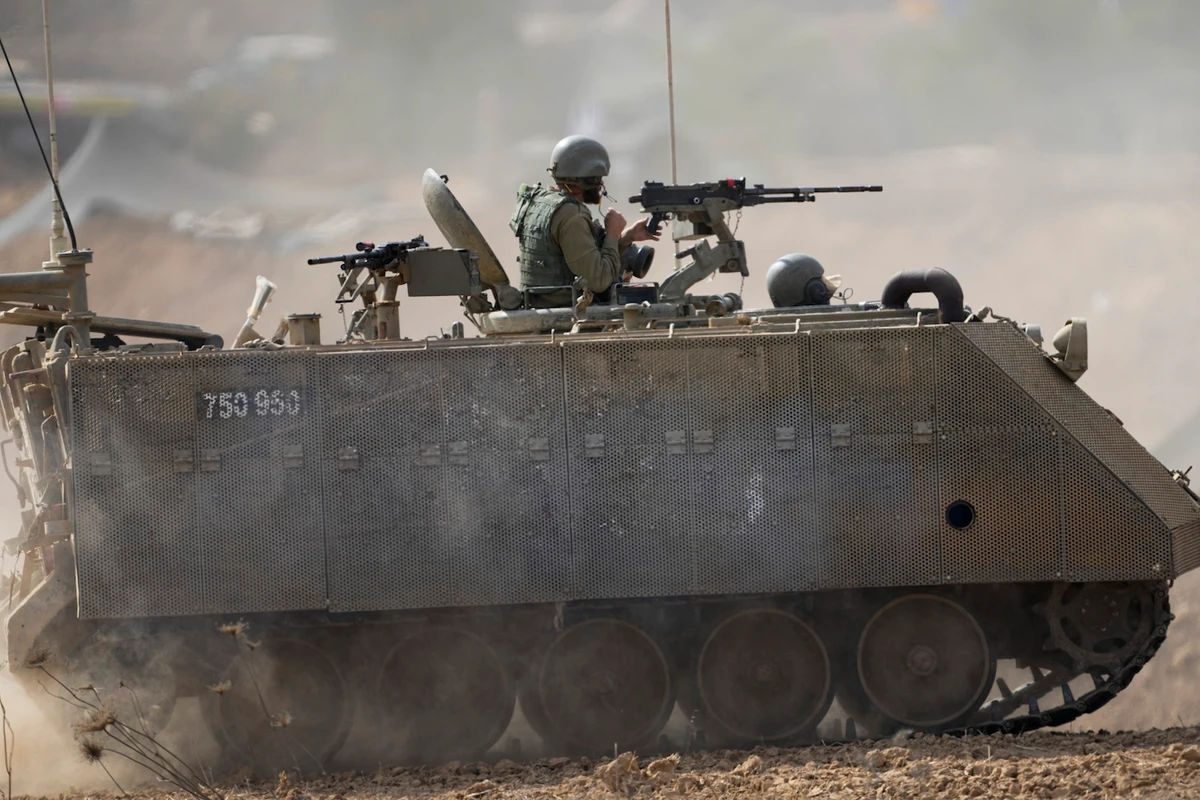 Israeli armored personnel carrier moves near the border with Gaza Strip on Tuesday, Oct. 31, 2023. (AP)
