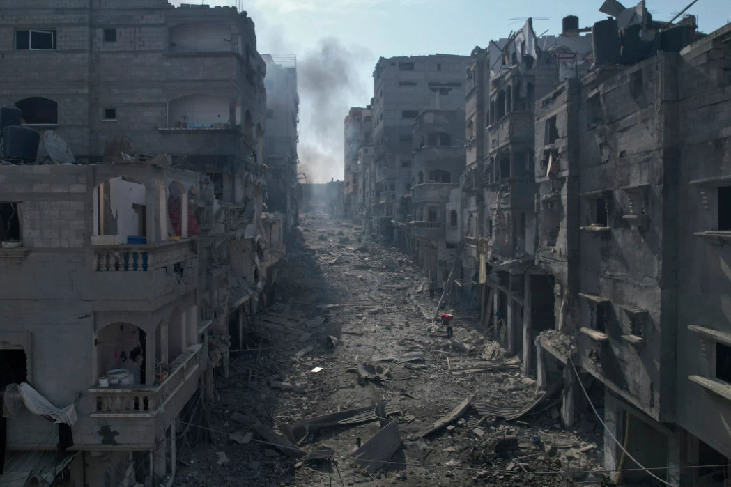 Rubble litters a street between smoldering buildings hit by an Israeli airstrike in Jabaliya, Gaza Strip, Oct. 11, 2023. (AP)