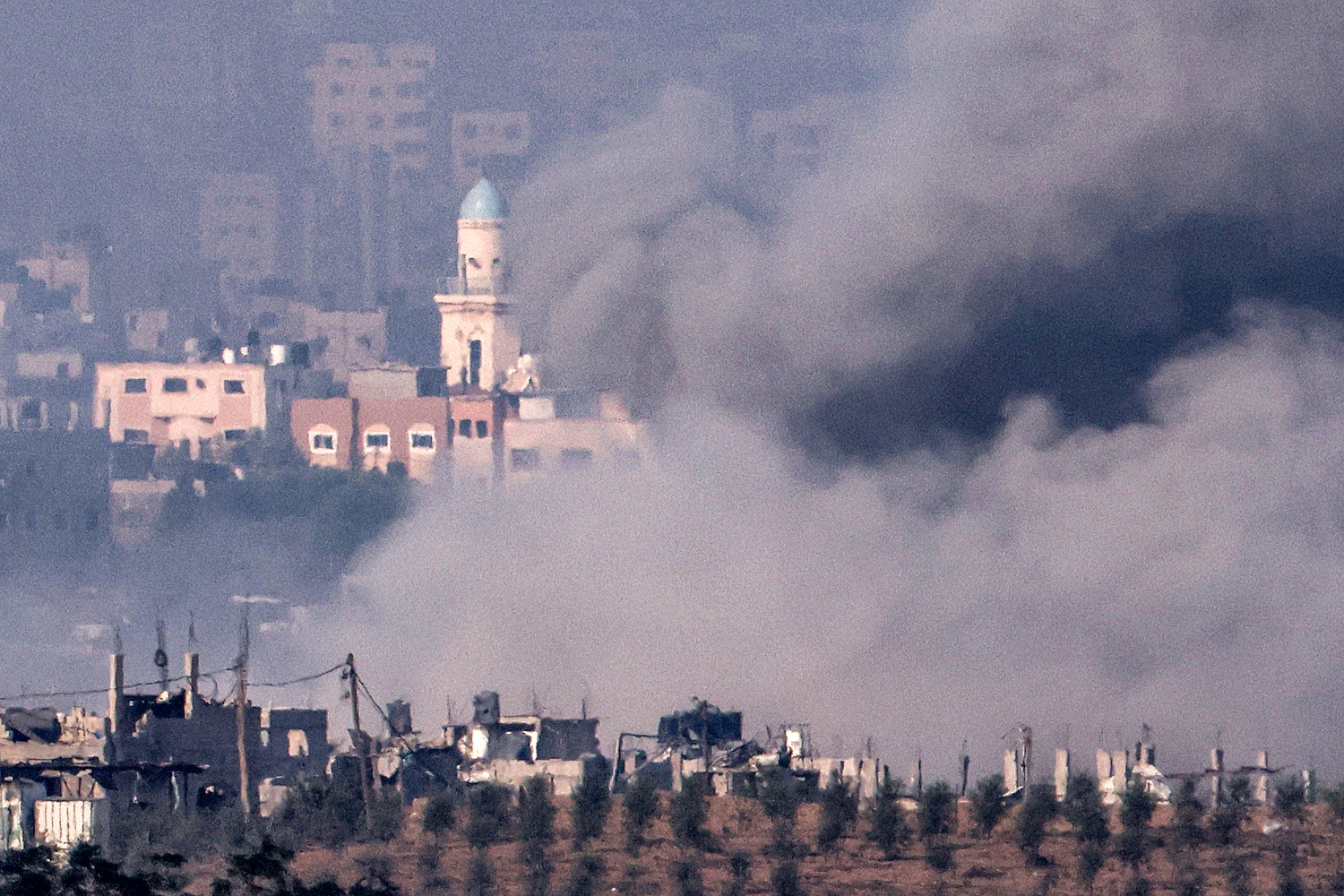 A smoke cloud obscures the Gaza skyline during Israeli bombardment amid ongoing battles between Israel and Hamas (File/AFP)