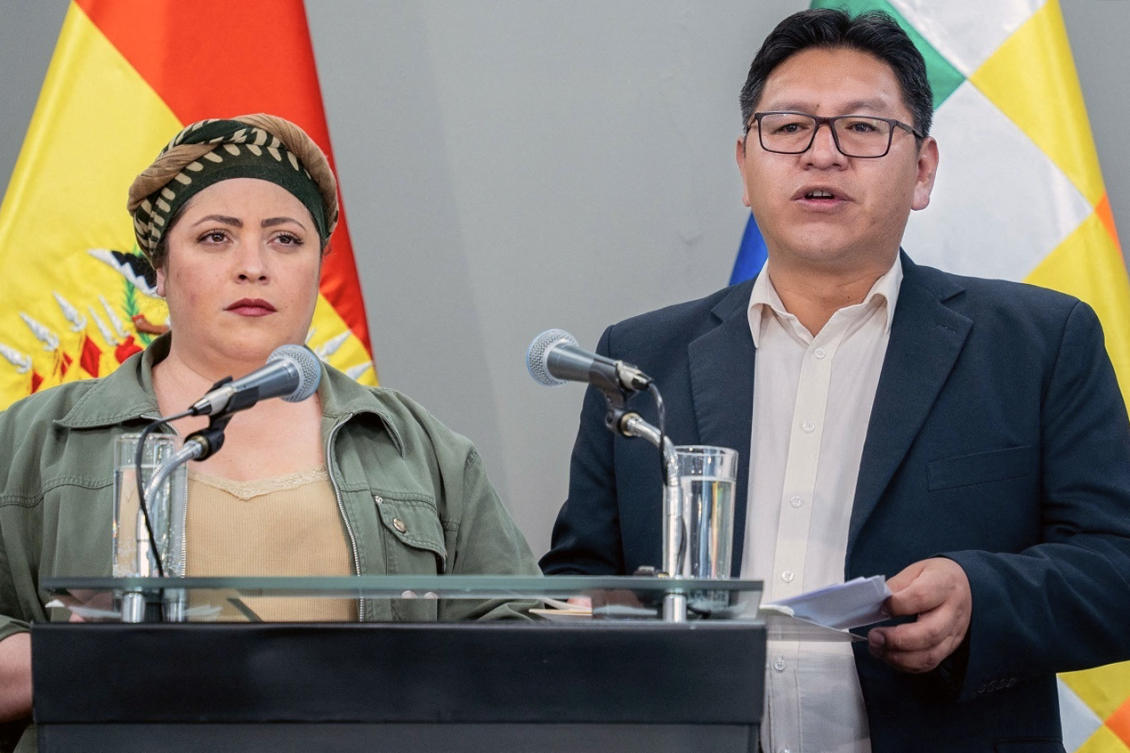 Bolivia's deputy Foreign Minister Freddy Mamani (R) speaks next to the minister of the presidency Maria Nela Prada, during a press conference announcing that Bolivia will break relations with Israel at the Casa Grande del Pueblo government palace in La Paz, Bolivia.(AFP)