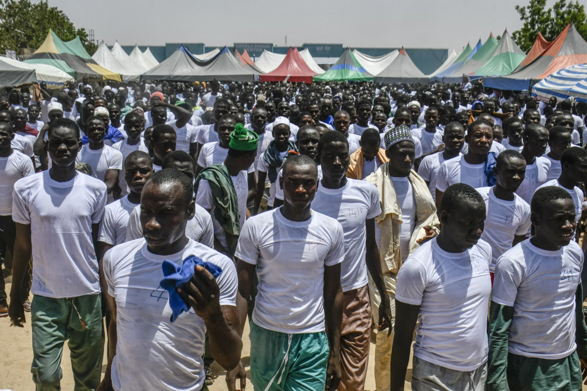 Some of the 2,100 former members of Boko Haram and of the Islamic State West Africa Province (ISWAP) are seen at the Hajja Camp in Maiduguri, Nigeria, on May 30, 2023 prior to their release at the end of a five month rehabilitation program. Despite the supposed surrender of many Bokon Faram members, the extemist group continues to pose danger to Nigerian communities. (Audu Marte / AFP)