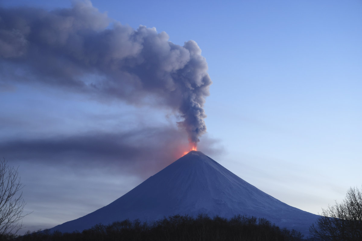 The Klyuchevskoy volcano erupts in Russia's northern Kamchatka Peninsula, Russian Far East, on Oct. 29, 2023. Huge ash columns erupted from Eurasia's tallest active volcano on Wednesday, Nov. 1, 2023, forcing authorities to close schools in two towns in the region. (AP Photo/Yuri Demyanchuk)