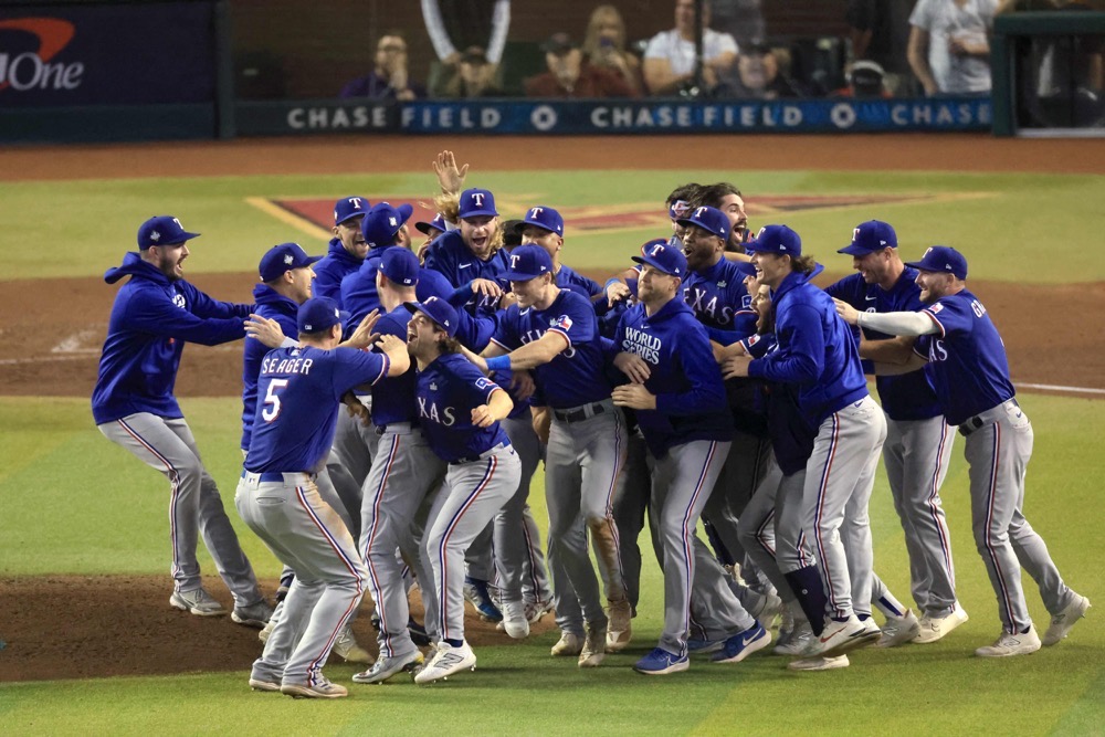 The Texas Rangers celebrate after beating the Arizona Diamondbacks 5-0 in Game Five to win the World Series. (AFP)