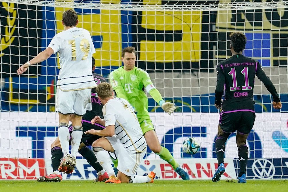 The record 20-time winners also lost in the quarter-finals at home to Freiburg last season. (dpa/AFP)