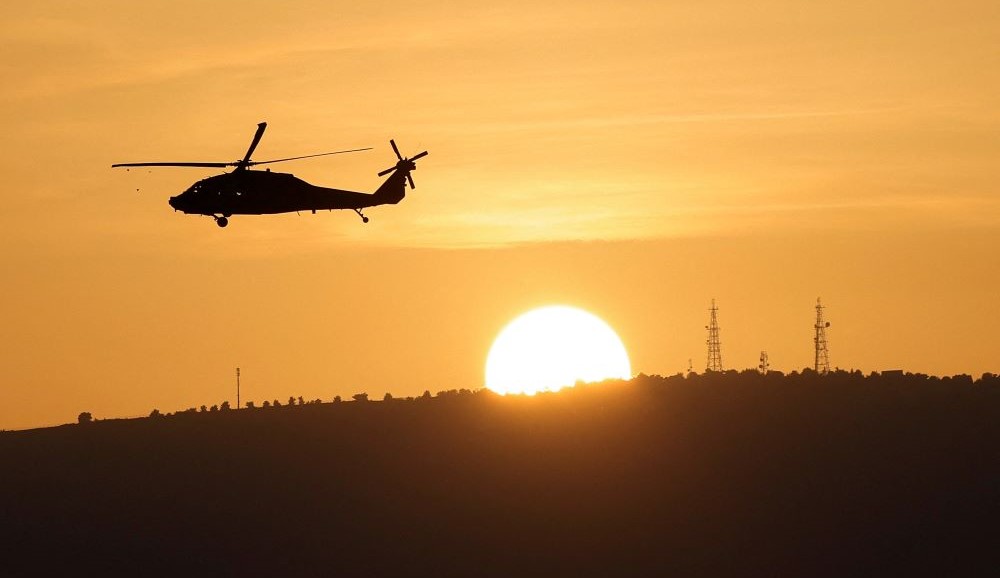 An Israeli military helicopter flies over Northern Israel near the border with Lebanon, Nov. 2, 2023. (Reuters)